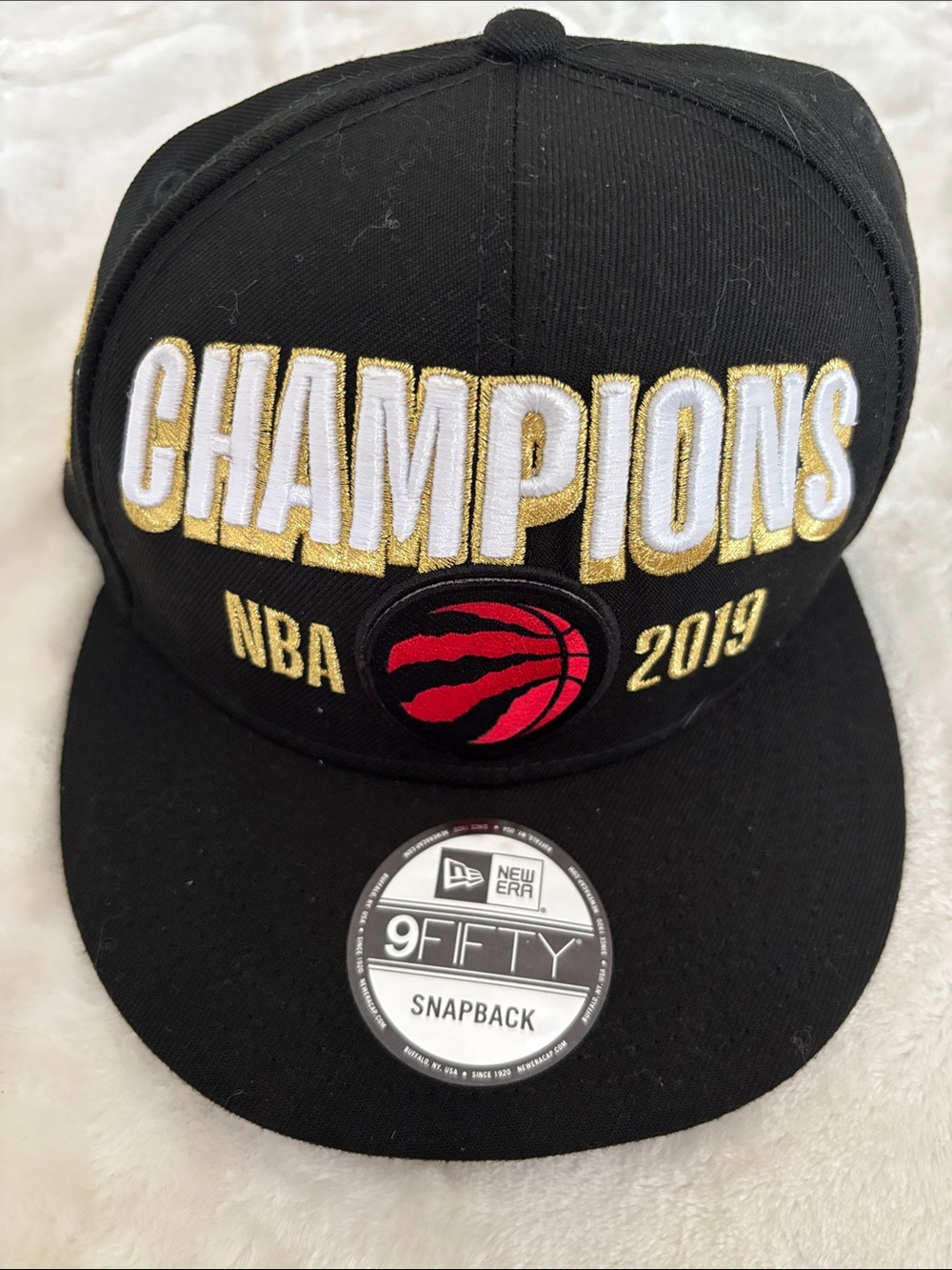 New Era Black & Gold Champions 2019 NBA Snapback Hat with Red Logo